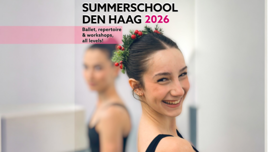 Smiling ballet student looking over her shoulder at the camera, Summerschool Den Haag pre-sale